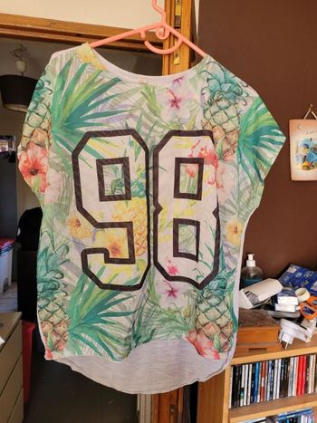 T-shirt devant resille dos blanc taille xl (plutôt taille L)