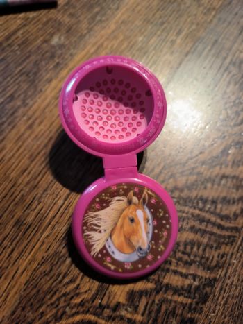 Brosse à cheveux ronde rose cheval