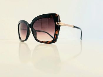 Lunette de soleil femme marron léopard et dorée verres dégradés UV protection catégorie 3