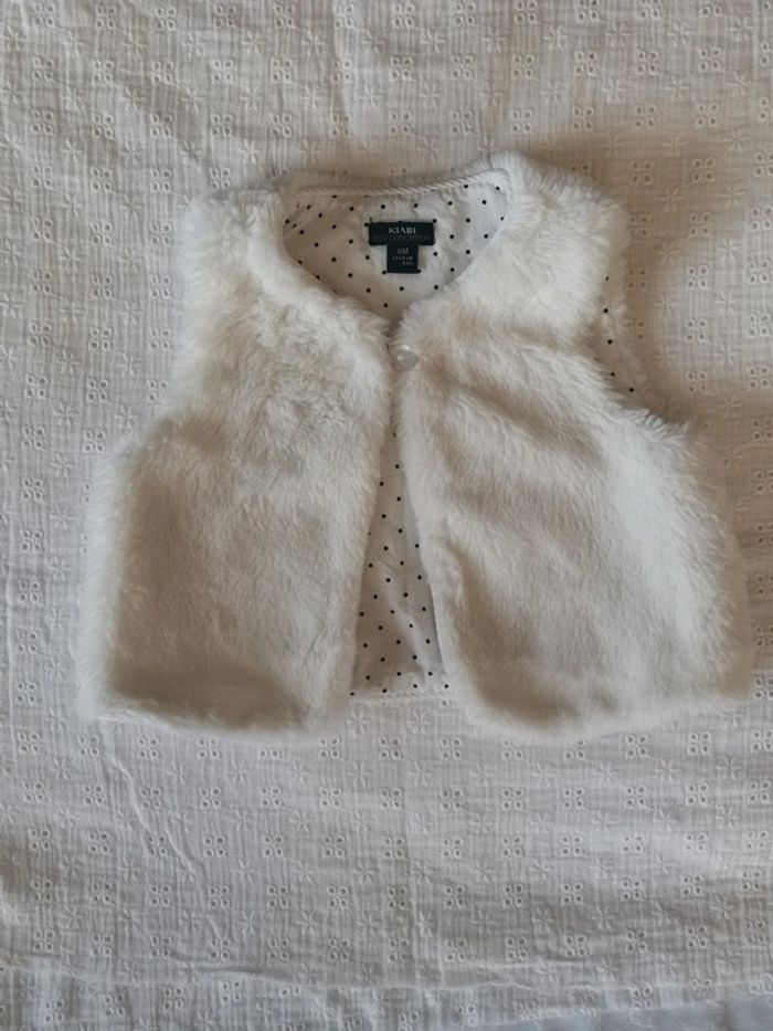 Gilet sans manches 6 mois