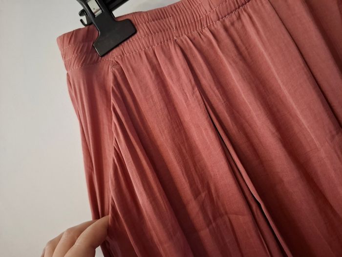 Jupe asymétrique rose poudre taille 40 en très bon état - photo numéro 2