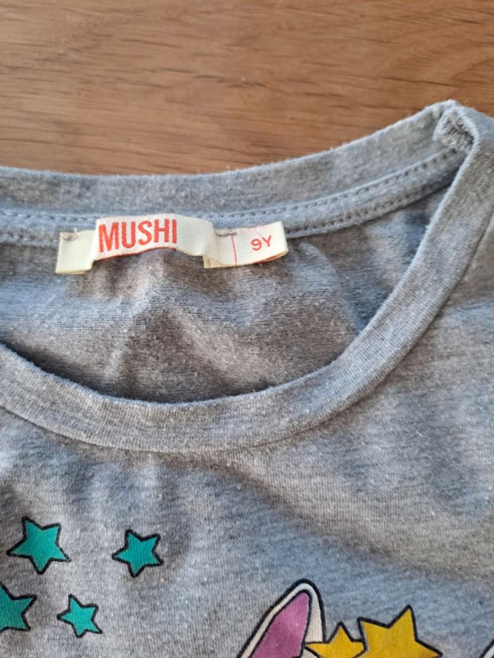 T-shirt sans manches. - photo numéro 2
