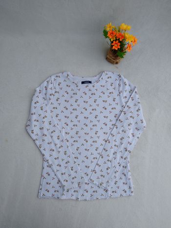 Polo fleuri fille Okaïdi 10 ans