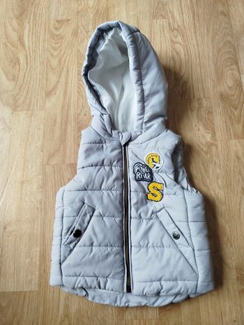 Manteau sans manche taille 3 mois