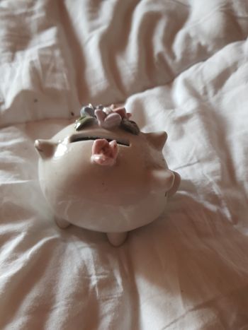 Tirelire en porcelaine cochon