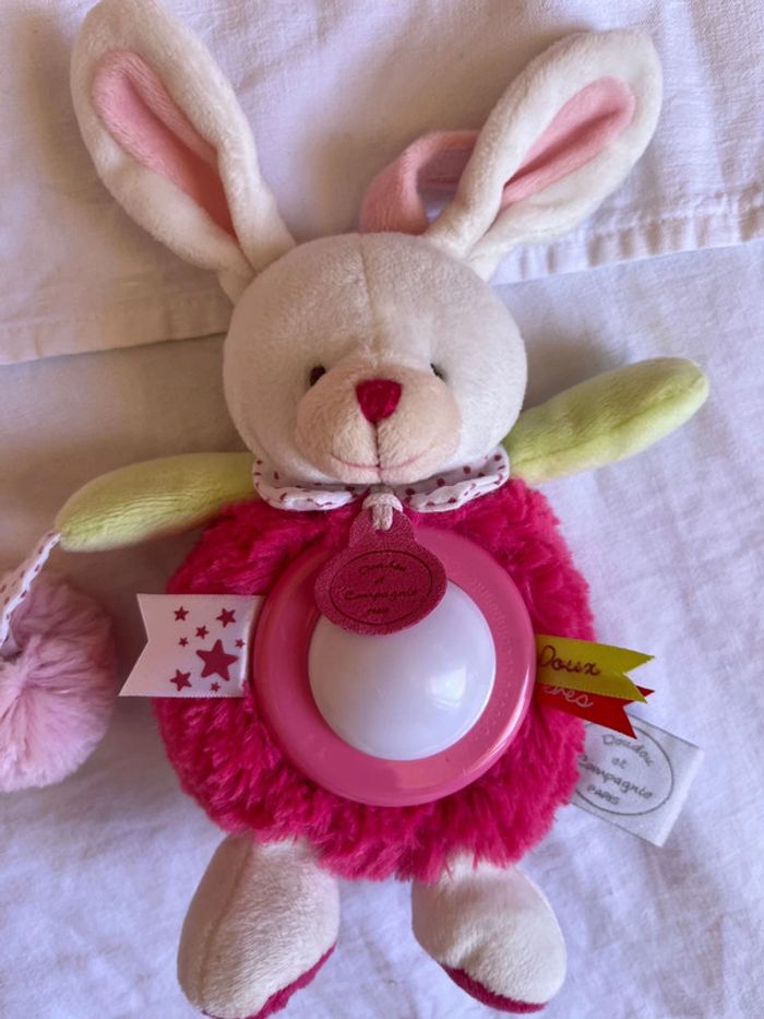 Doudou avec lumière douce rose