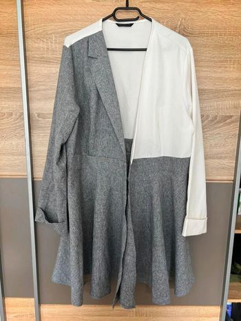 Gilet gris et blanc