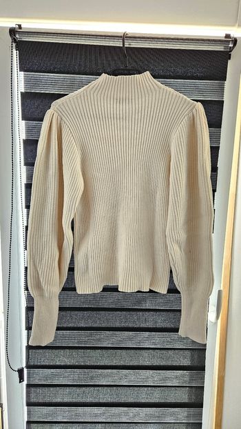 Pull col montant