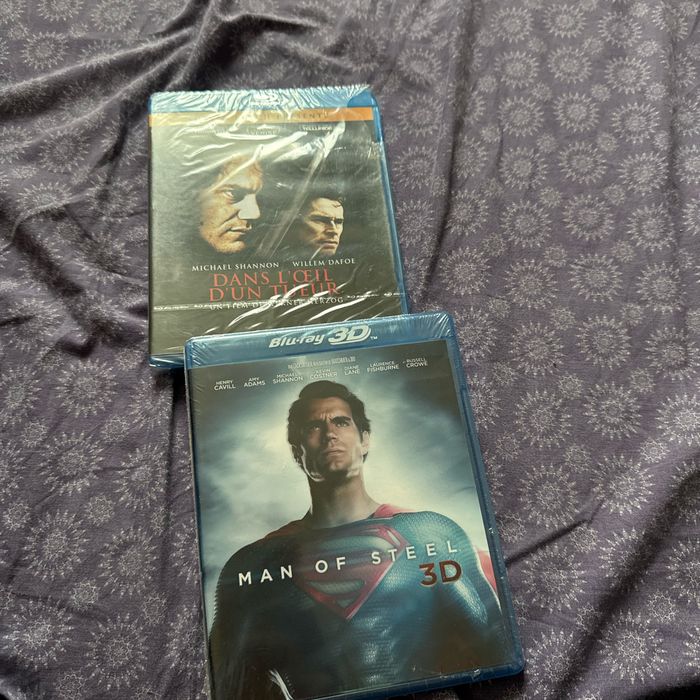 Deux dvd blu-ray man of steel 3D et dans l œil d’un tueur
