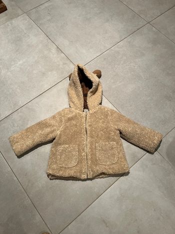Manteau moumoute à capuche