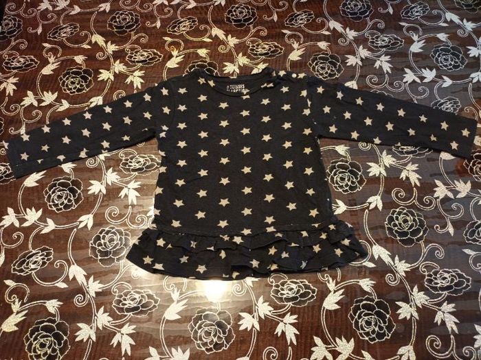 Tee-shirt manches longues noir imprimé étoiles