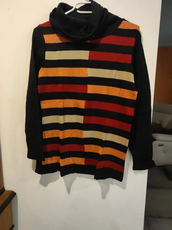 Pull col roulé