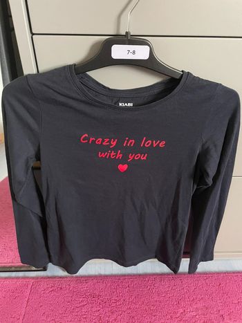 Pull noir et rouge fille