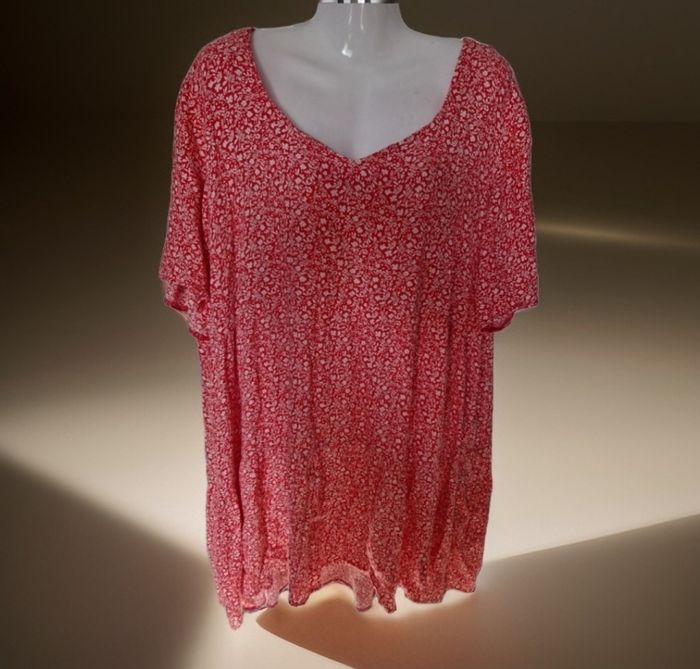 Superbe robe tunique évasée style volants