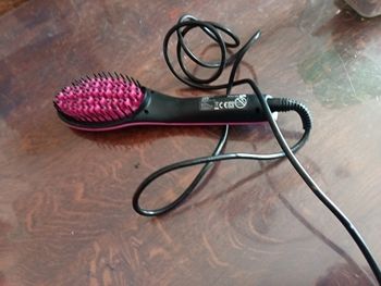 Brosse lissante et chauffante