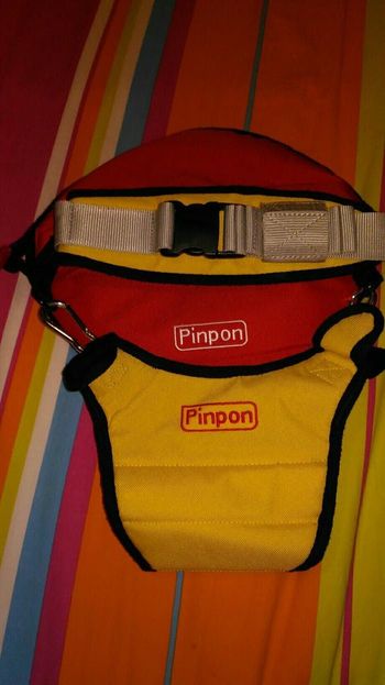 Porte bébé pinpon sur le dos où sur les hanches