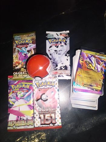 Lot mystère pokeball figurine eevee 4 boosters 1 ultra et 100 random