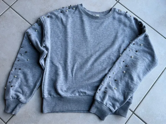 Pull avec perles