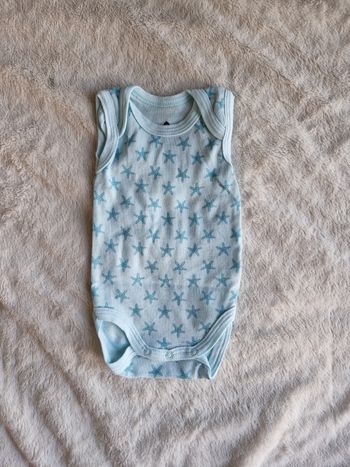 Bodie manche courte
Taille 3 mois
État neuf