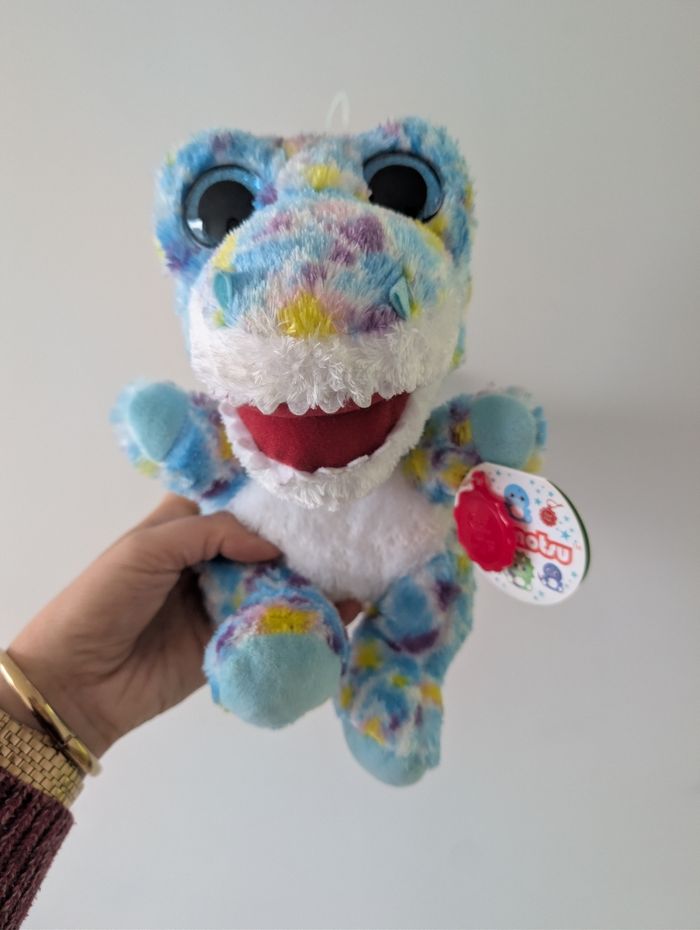 Peluche dino colorée neuve