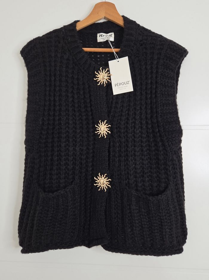 Pull avec soleils noir