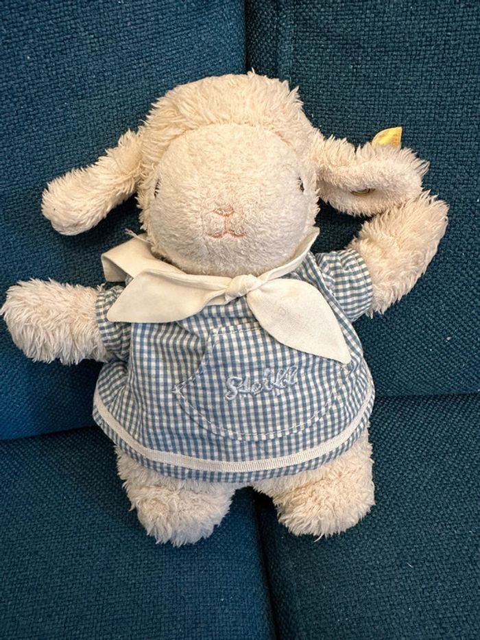 NEUF Peluche musicale Agneau Mouton Steiff tablier doudou berceuse 20cm collection