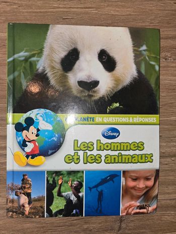 Livre Disney "Ma planète Les hommes et les animaux"
