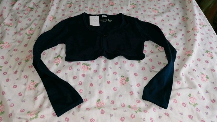 Gilet boléro neuf 8 ans