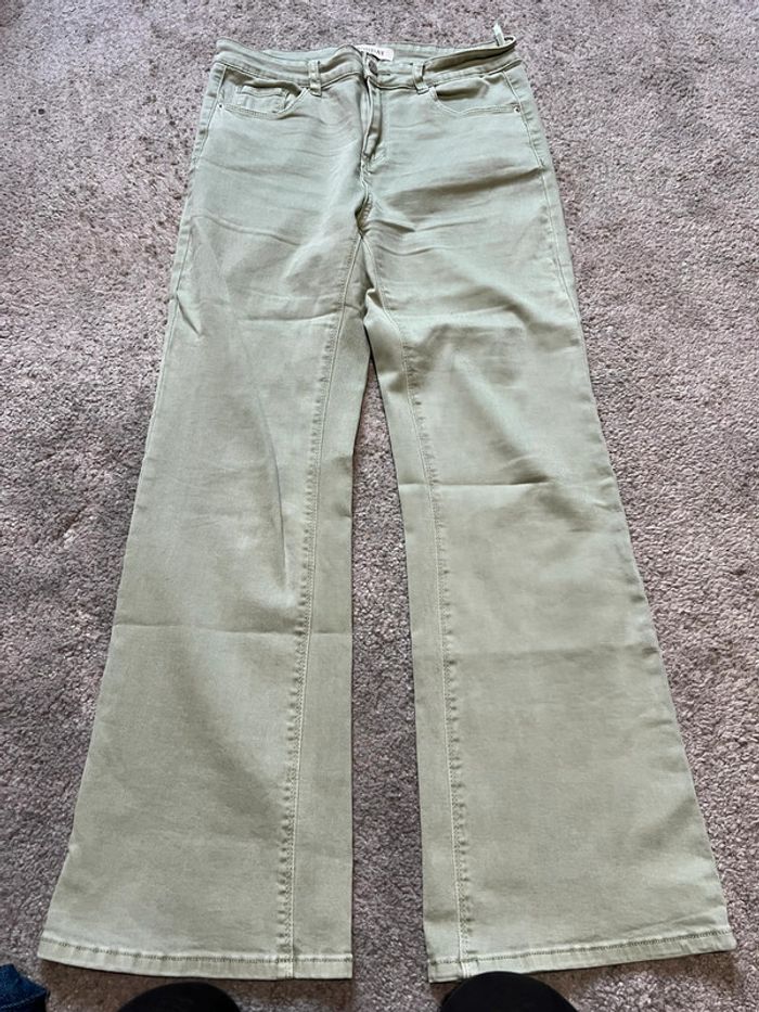 Jeans vert d’eau