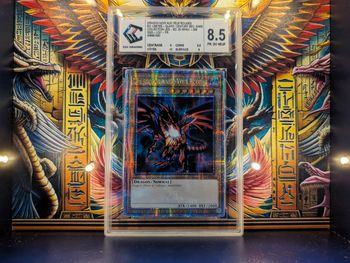 Dragon Noir aux Yeux Rouges Yu-Gi-Oh LC01-FR006 - Grading 8.5 CCC - Prismatique Rare