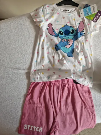 Ensemble stitch rose 6 ans neuf