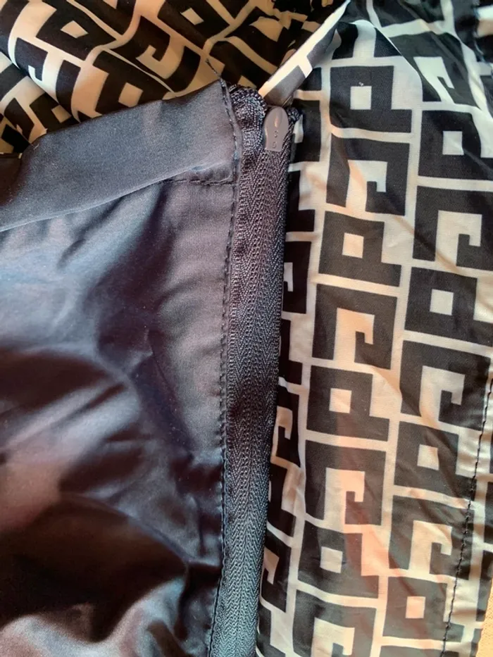 Veste imperméable réversible. - photo numéro 3