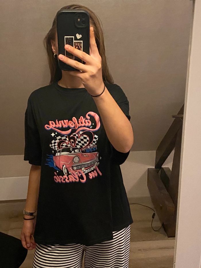 t-shirt large, over size noir à dessin rose - photo numéro 4