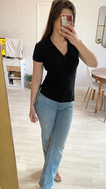 Polo noir manches courtes