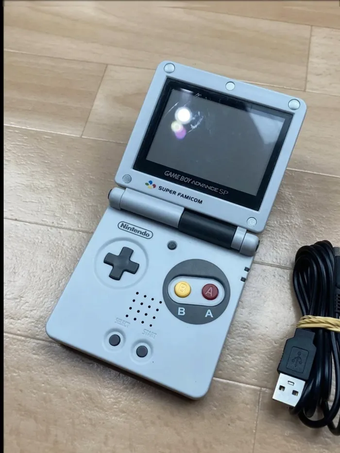 Nintendo Game Boy Advance SP - Super Famicom - Très bon état - Envoi Rapide - Garantie 6 Mois - photo numéro 2