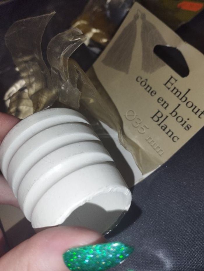 Embout tringle a rideau