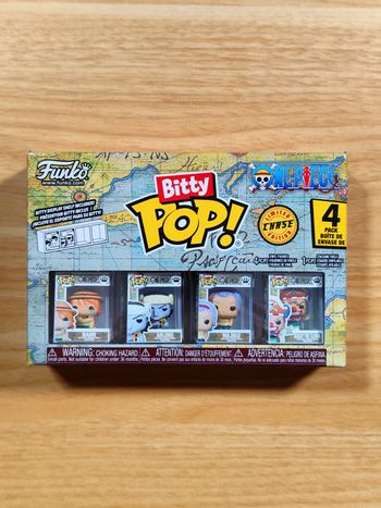 Boîte De 4 Bitty Pop! One Piece - Nami, Arlong, Nojiko + Buggy CHASE