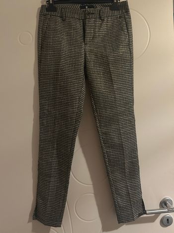 Pantalon noir et dorée