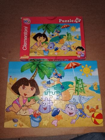 Puzzle TBE complet 104 pcs Dora Clémentoni