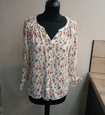 Jolie chemise fleurie
Taille 38