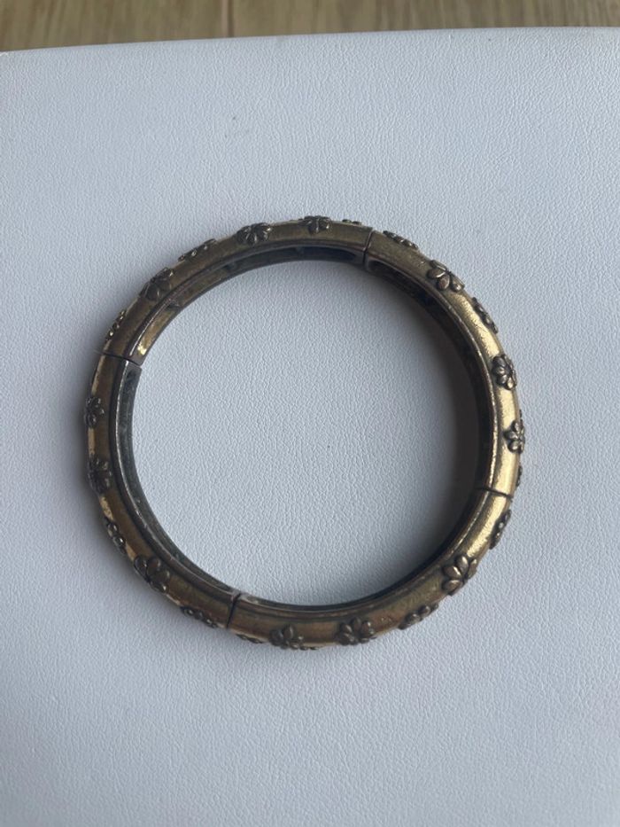 Jonc élastique dorée avec motifs fleurs