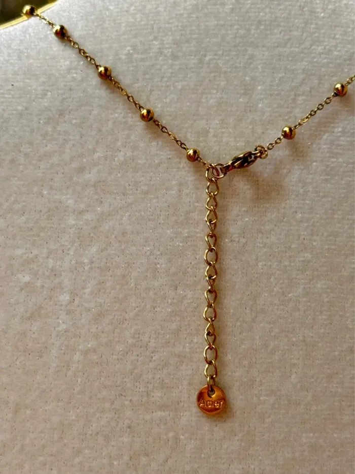 Collier chaîne réglable acier inoxydable or boules fleurs perles noires - photo numéro 4