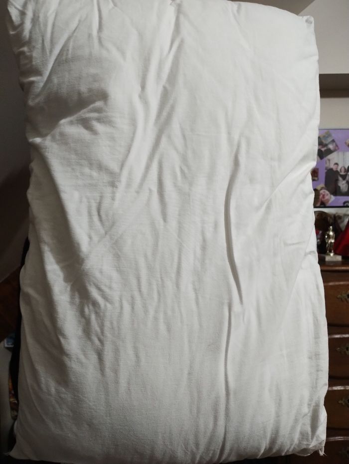 Oreiller bébé 40x60 en très bon état marque perlarara