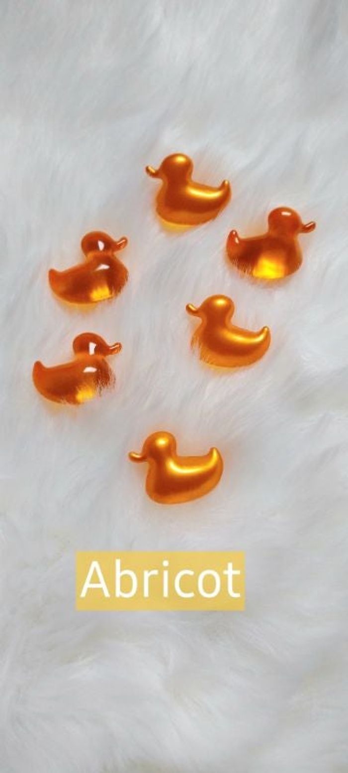 Perles de bain abricot
