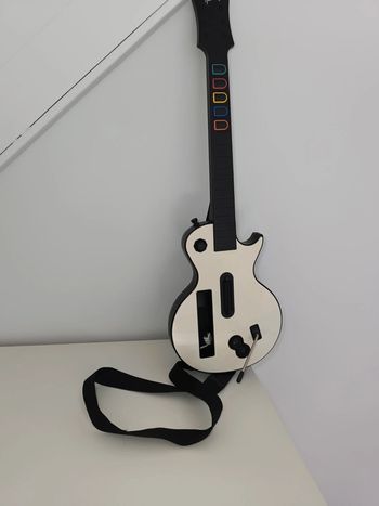 Wii - Guitare hero ( faire offre )
