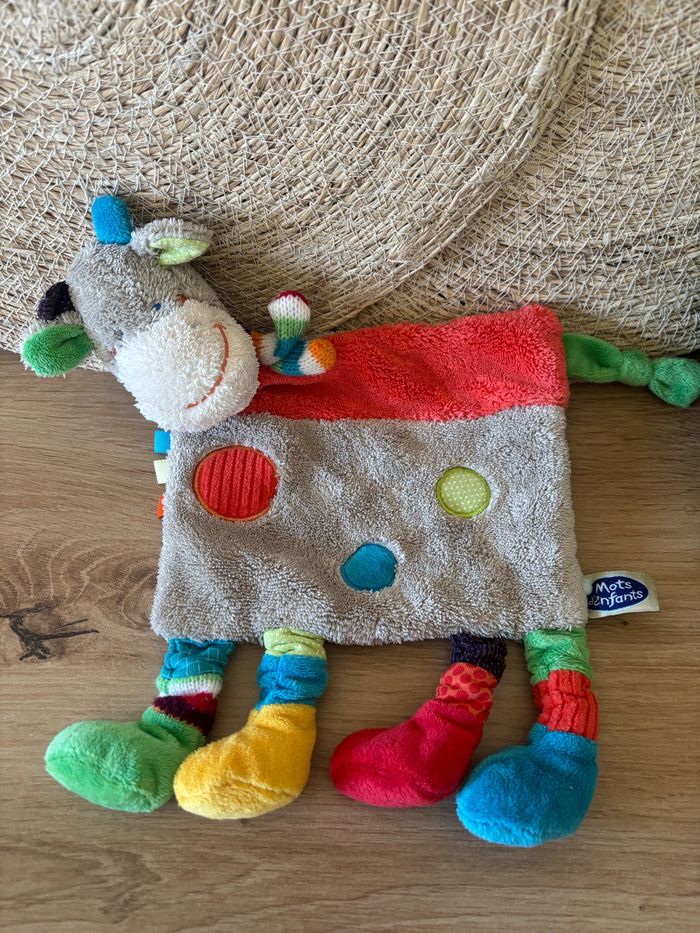 Neuf doudou plat vache multicolore mots d enfants