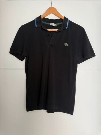 Polo noir Lacoste homme S ou 36