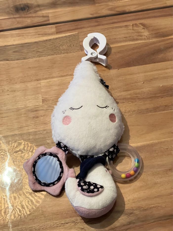 Peluche d’activités avec pince Miss fleur de lune