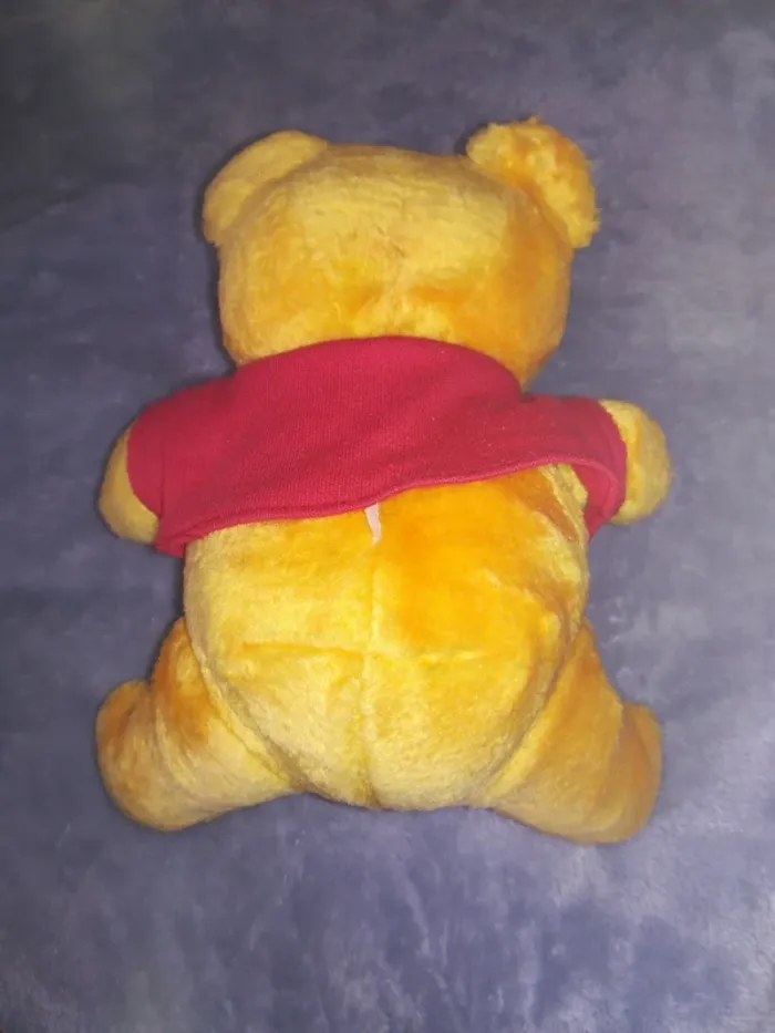 Petit doudou Winnie l'ourson - photo numéro 5