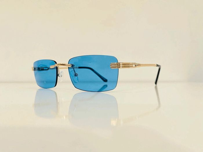 Lunette de soleil mixte percée dorée verres bleus uvprotection taille small - photo numéro 3